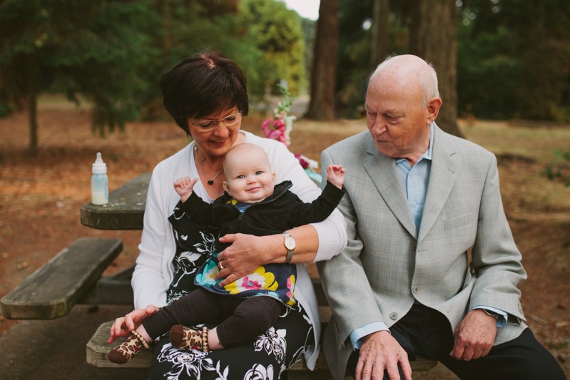 Grandma holding adorable baby in Lincoln Park, Seattle. 