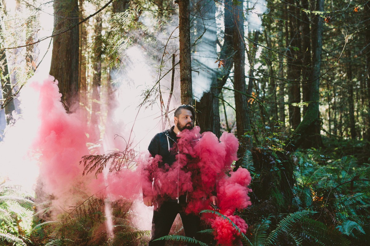Casey Crescenzo of The Dear Hunter with smoke grenades in Port Angeles, WA | Kerrang! Magazine photographer Meghann Prouse | www.photomegs.com