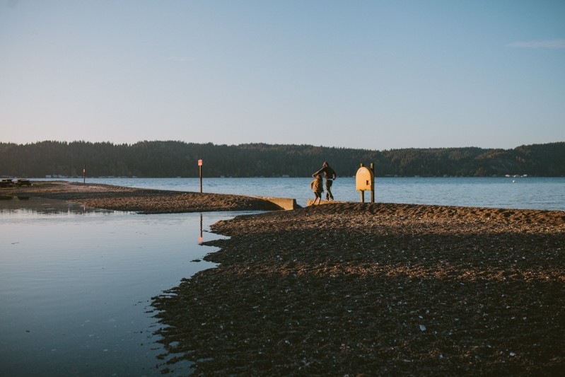Father and son playing along the water at Twanoh State Park.