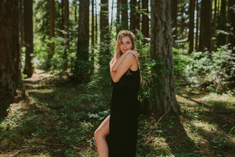 Beautiful model in a black dress at Kitsap Memorial State Park.