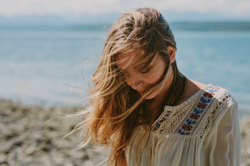 Boho style in Poulsbo, with long hair and a peasant top.