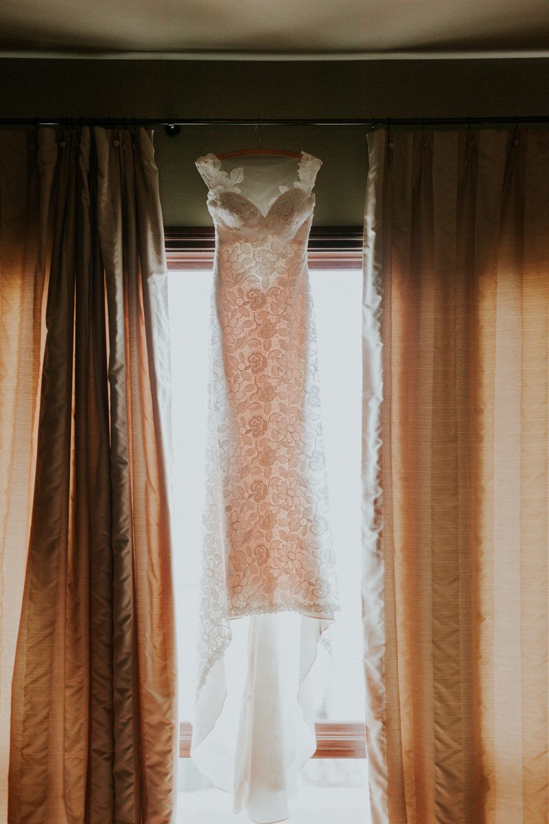 Romantic floor-length embroidered wedding dress with a sweetheart neckline and illusion back.