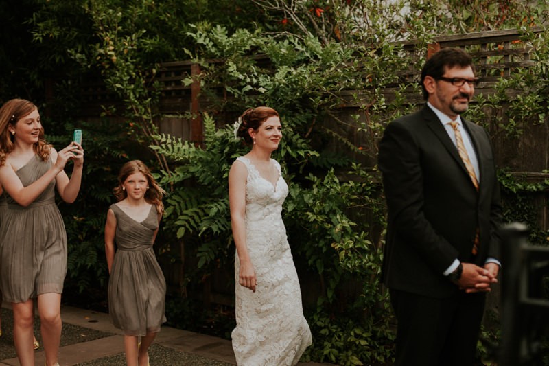 Sweet first look moment, at the bride and groom's home.