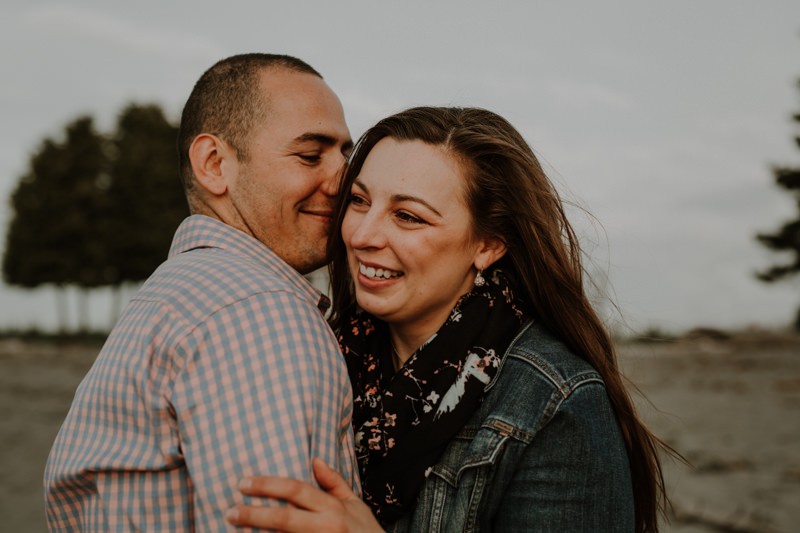 Playful Poulsbo-area engagement session on the beach. 