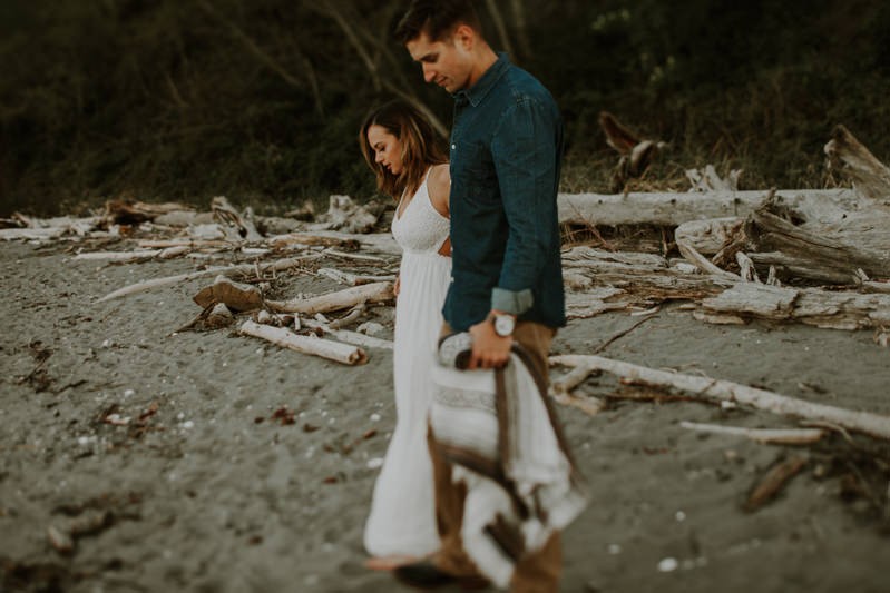 PNW destination engagement photos on a sandy beach in Kitsap County. 