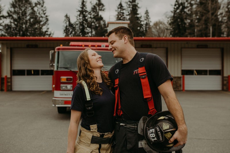 Non-traditional PNW fire station engagement session with two fire fighters. 